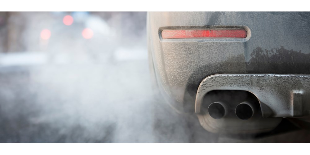 A car idling pumping out fuel